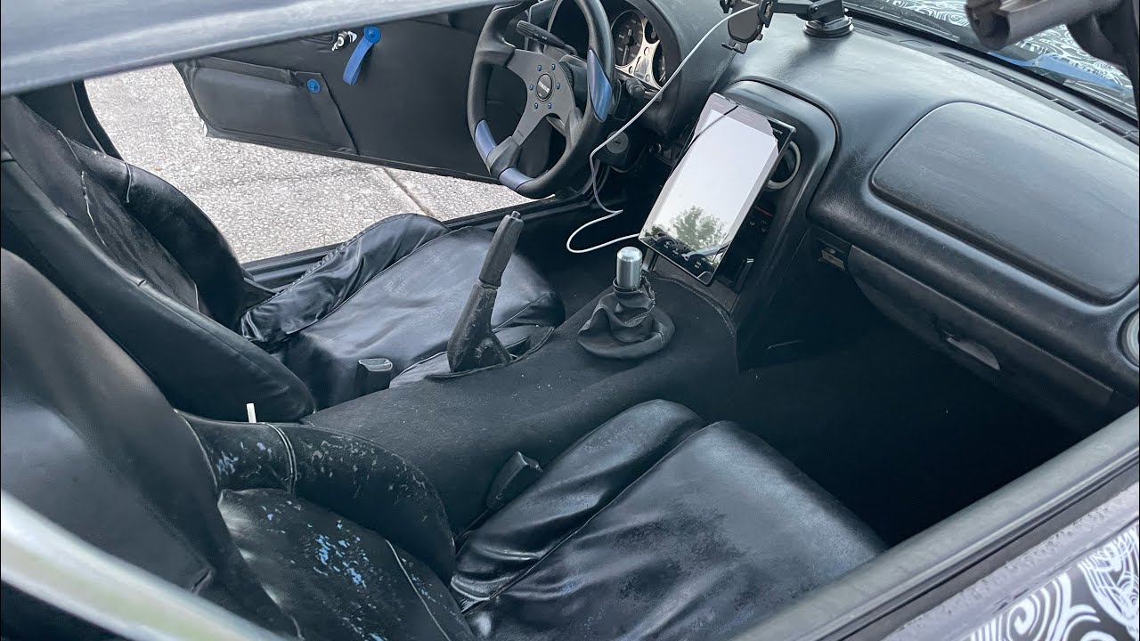 Removing 1990-1997 Miata passenger right seat from car that’s been in the rain 20 years with no top.