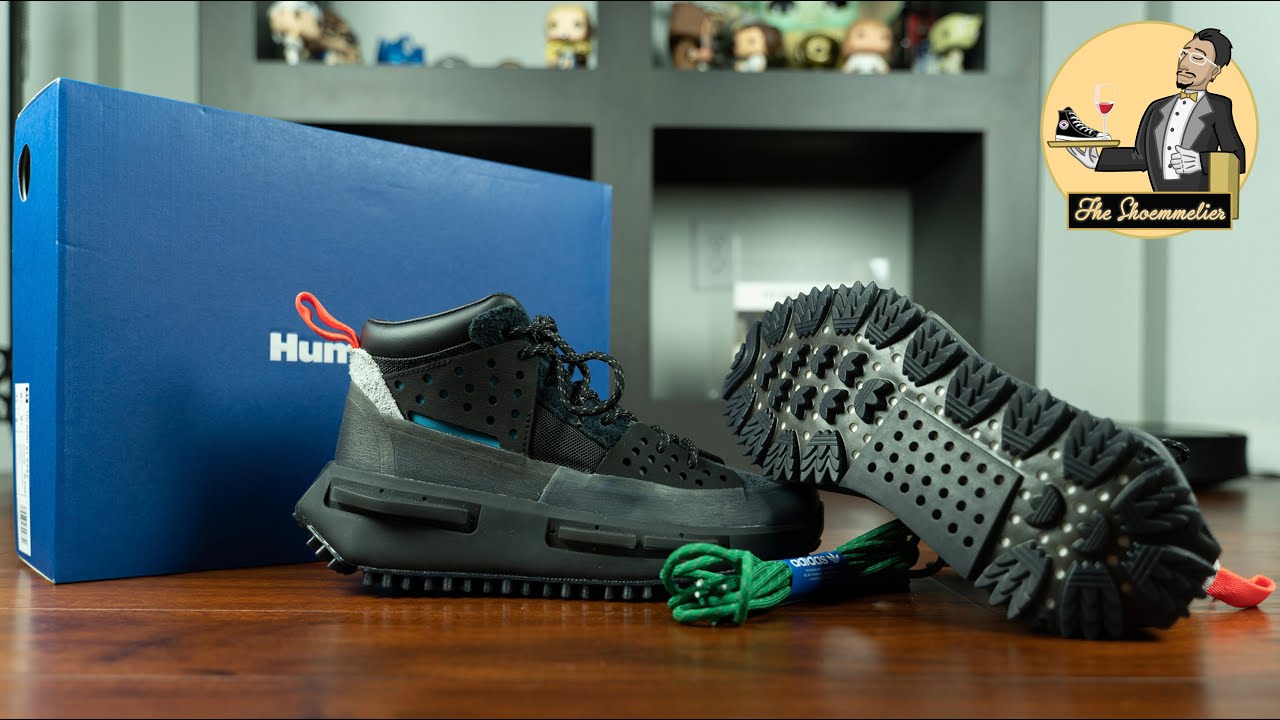 Где RYAT на кроссовках Pharrell Williams x adidas Hu NMD S1 RYAT 'Core Black?'