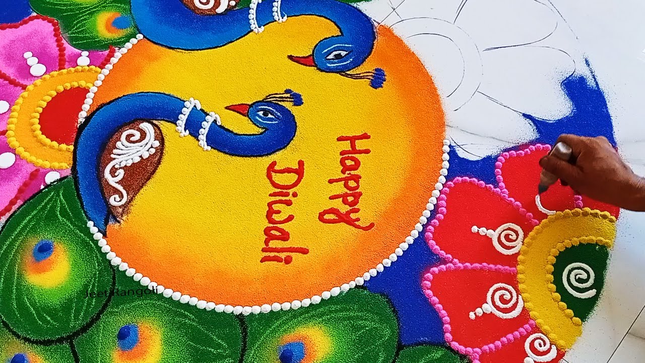Big and colourfull peacock rangoli design.