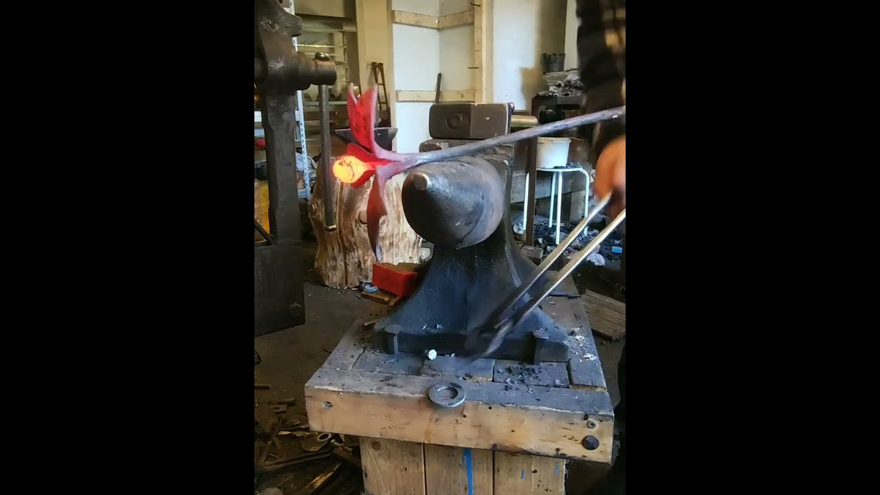 Blacksmithing- The forging of a flower.