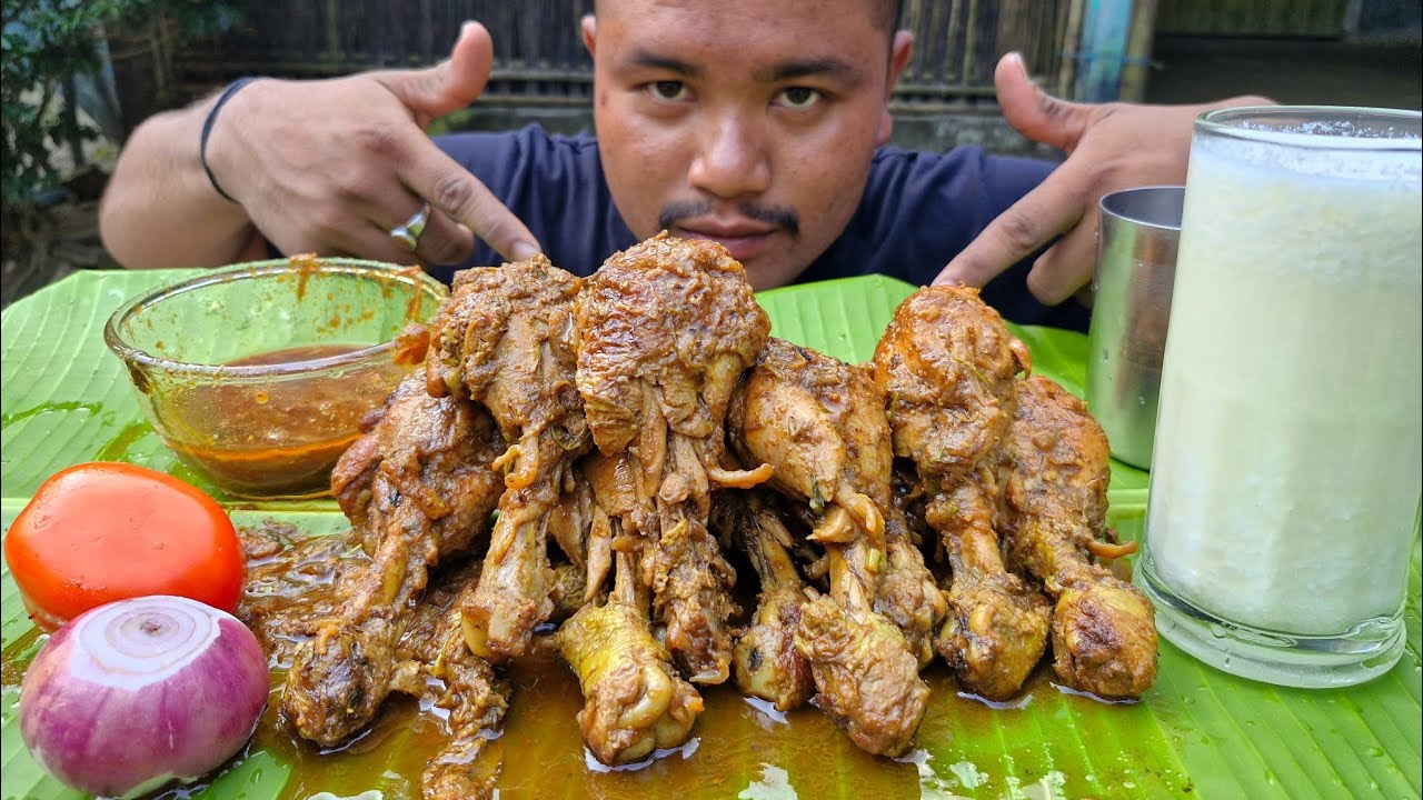 EATING SPICY CHICKEN LEG PIECE GRAVY 