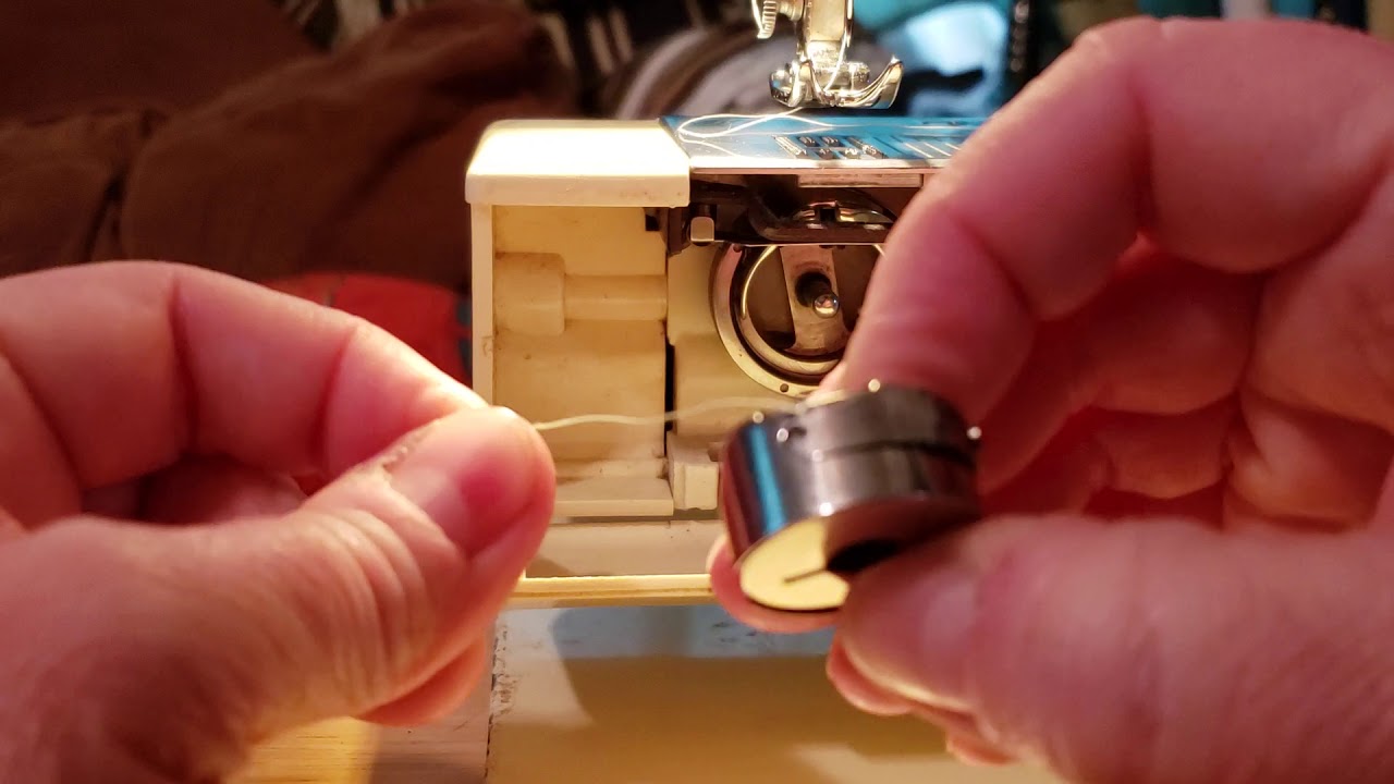 How to install the bobbin on a Riccar RE 571 electronic super-stretch sewing machine