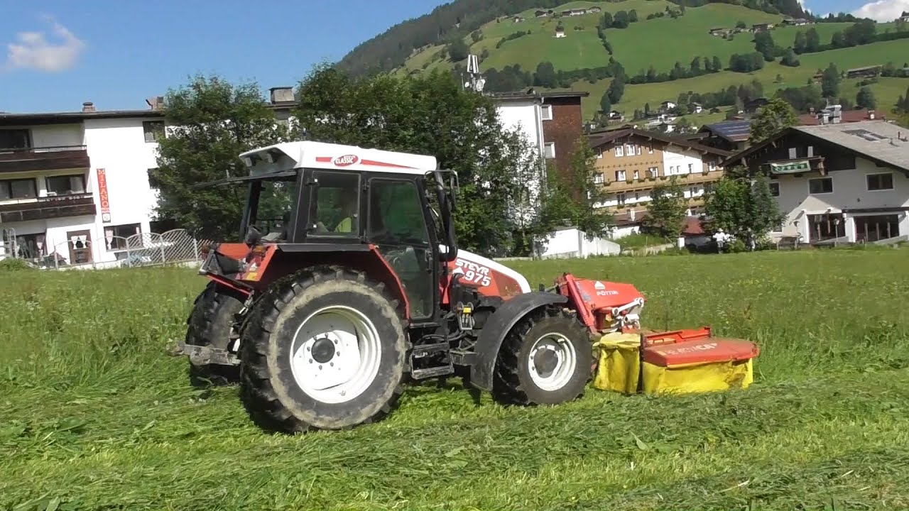 Mowing hay Steyr & Pöttinger