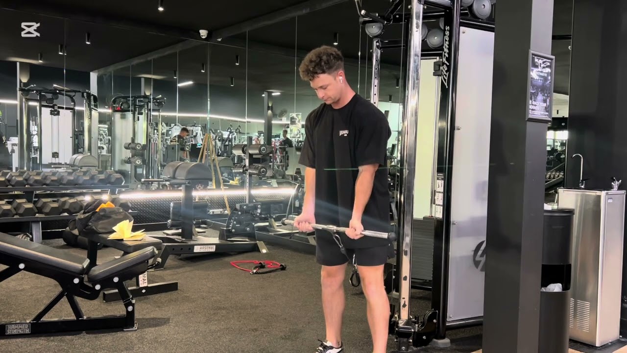 Exercise Tutorial - Between Legs Cable Bicep Curl