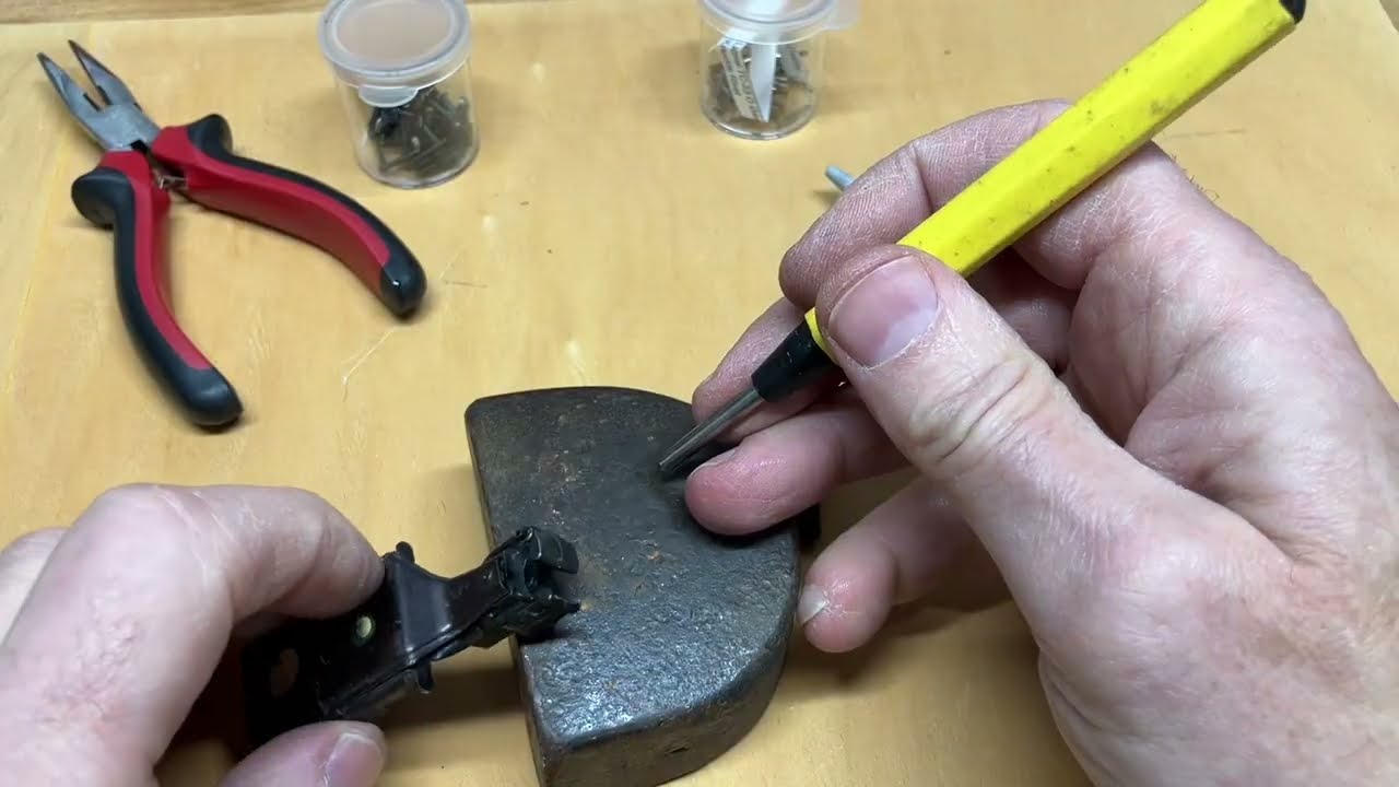 Installing a new spring in a Lionel knuckle coupler 