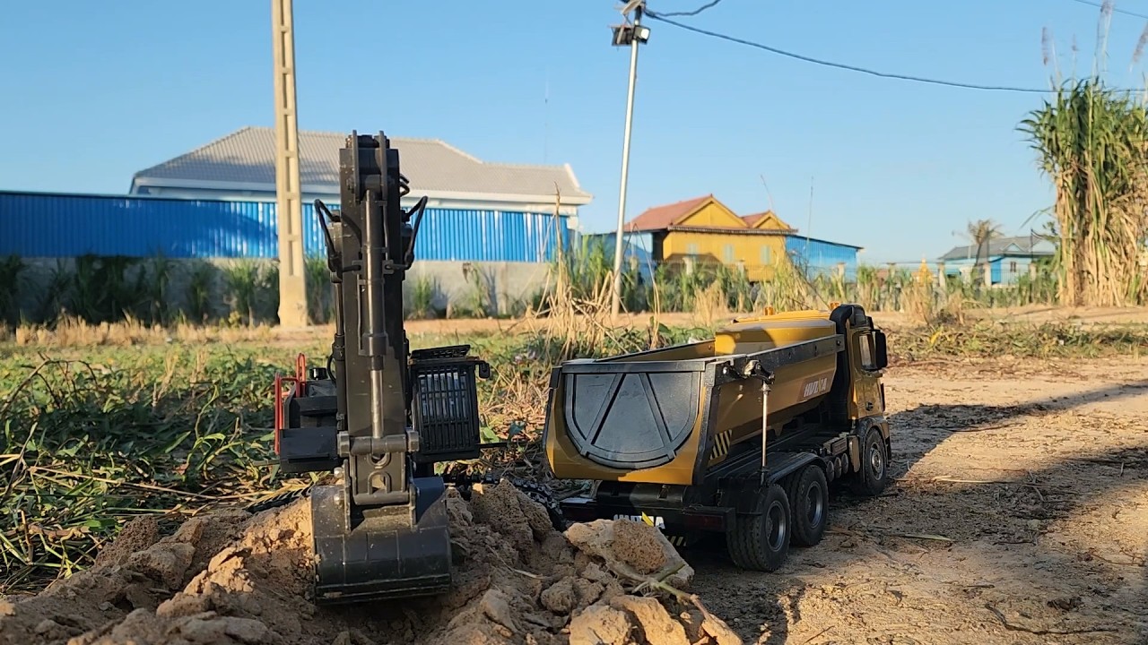 Earthmoving Essentials: Excavator and Dump Truck Duo