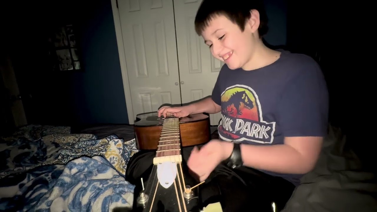 Zachary Learning Guitar