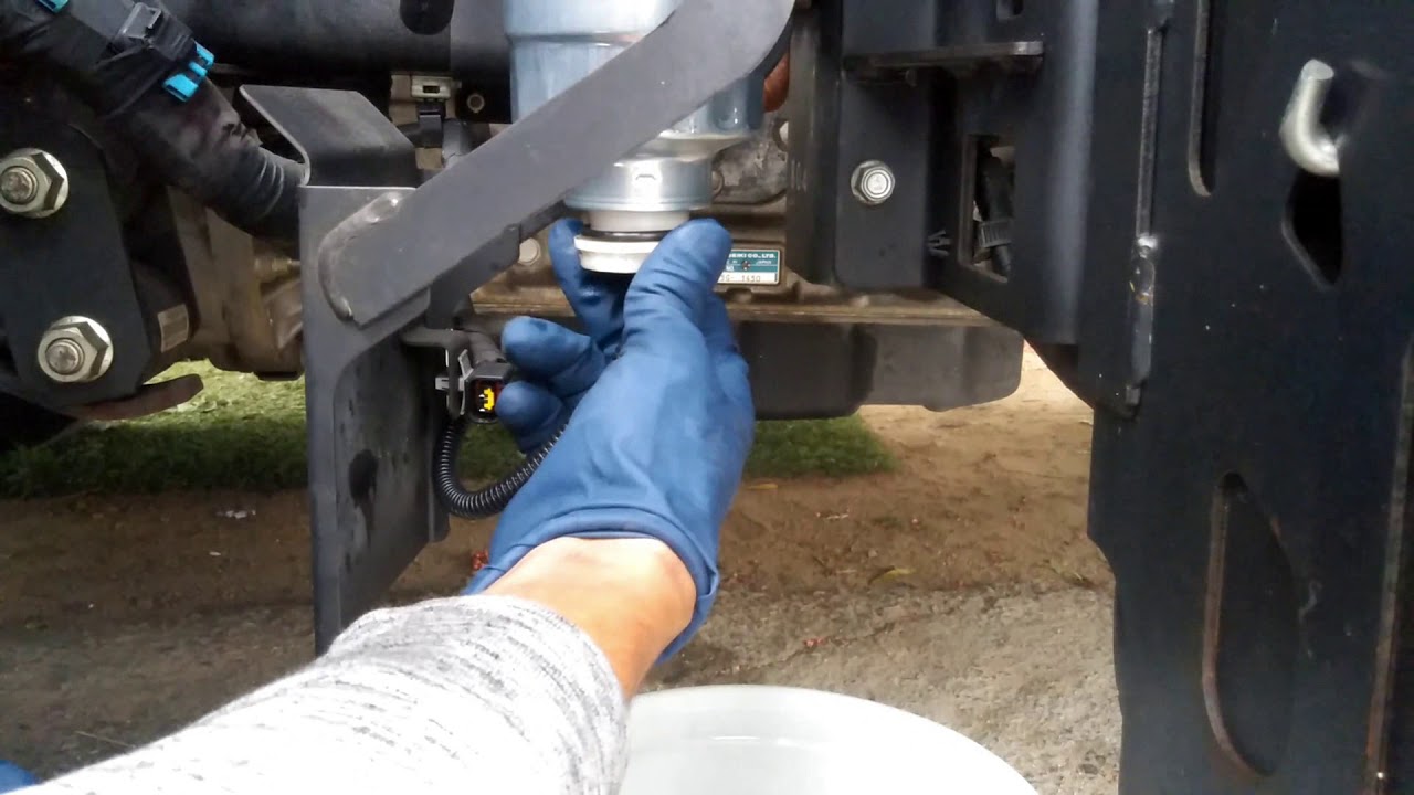 2016 isuzu nrr fuel filter change