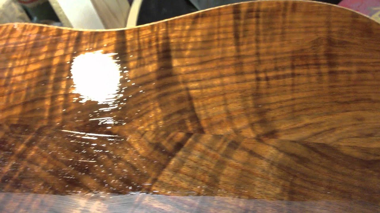 Brushing lacquer on a guitar part 1