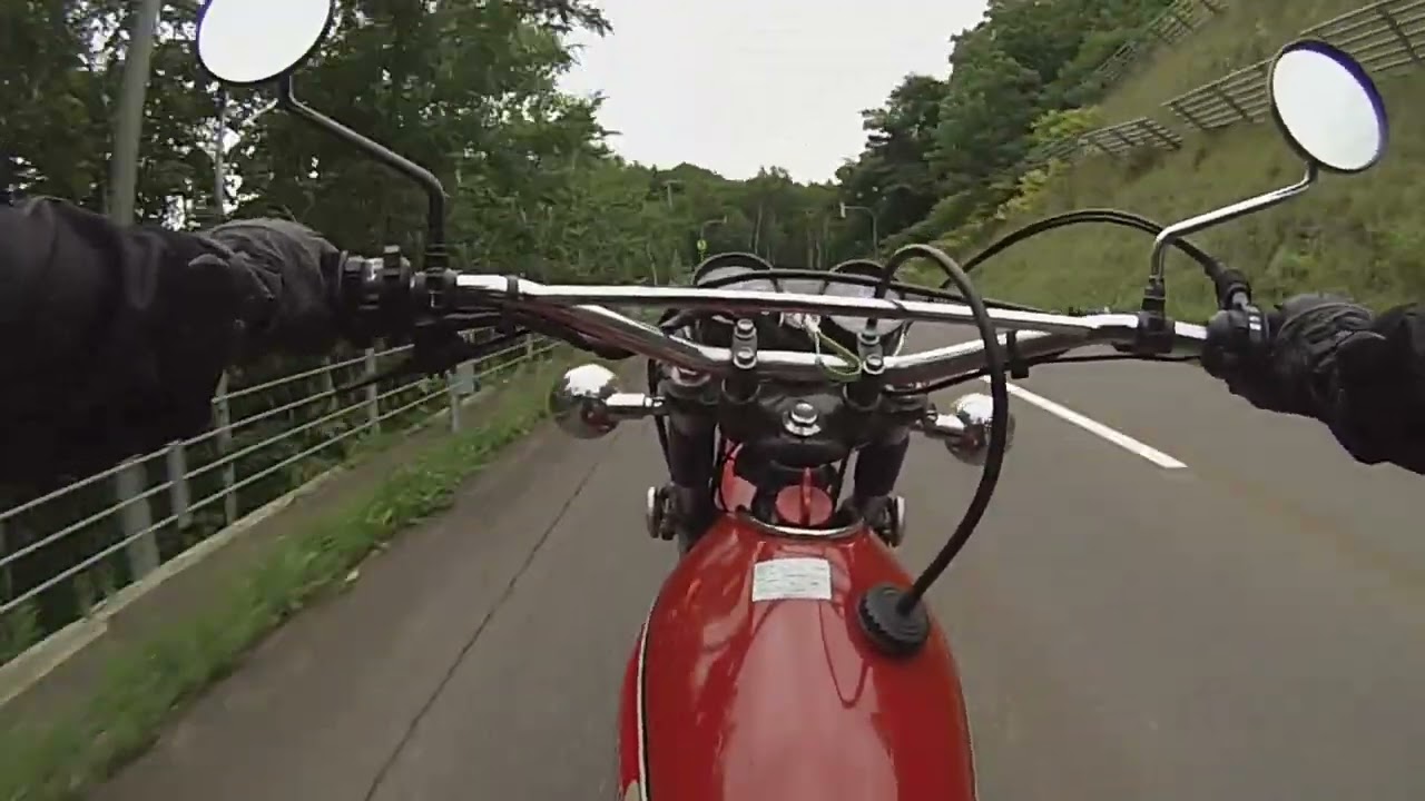 1976 Yamaha XT500 riding on mountain road