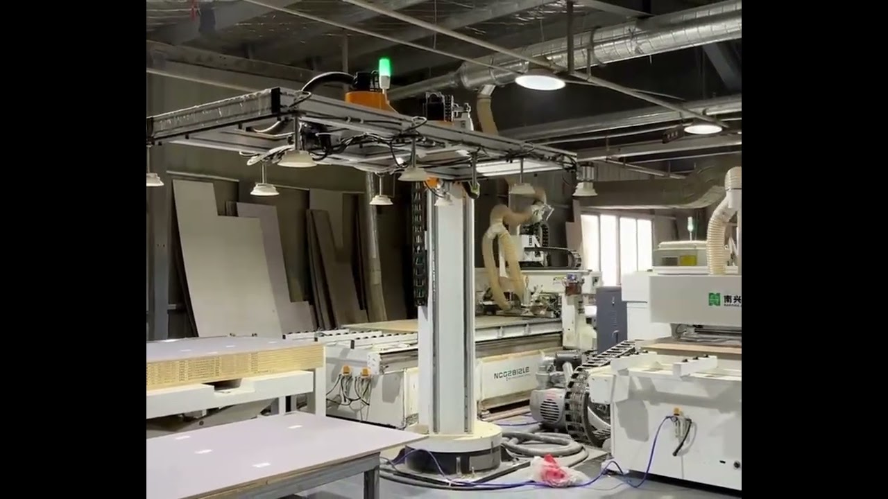 One robotic arm can feed two CNC panel saws at the same time, boosting efficiency and reducing labor