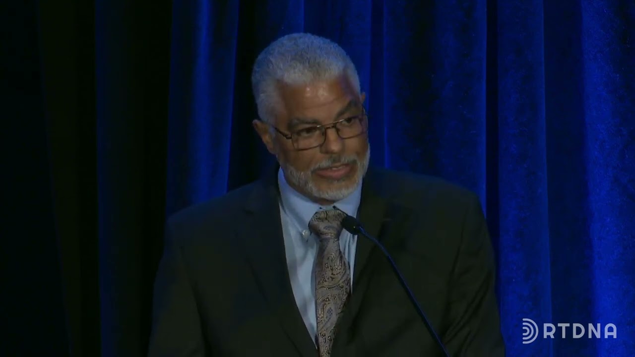 Keith Woods accepts the 2023 RTDNA Foundation First Amendment Service Award
