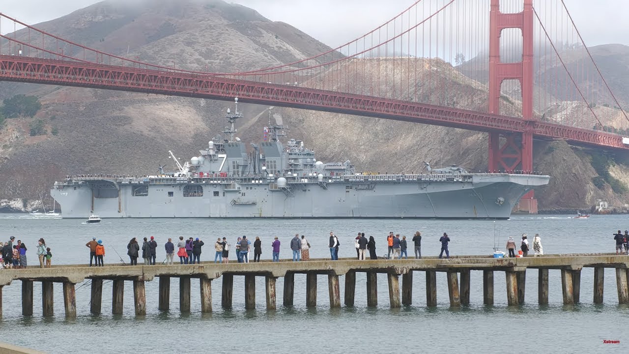 Amphibious assault carrier USS Tripoli (LHA 7) leads the Parade of Ships at San Francisco Fleet Week