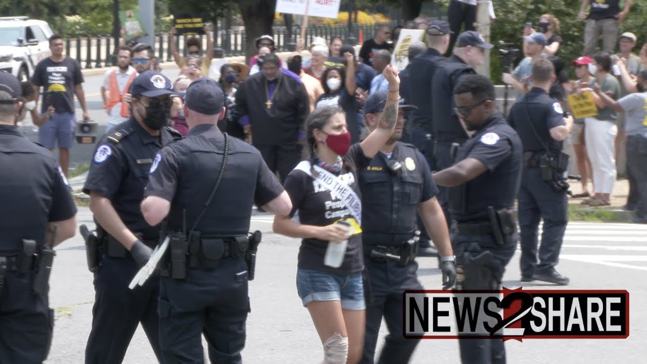 Voting rights protesters led by Rev. Barber arrested outside Capitol