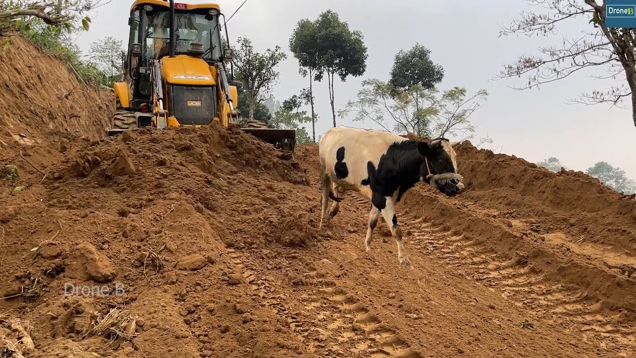 JCB Backhoe Connects RURAL MOUNTAIN VILLAGE WITH a Proper ROAD
