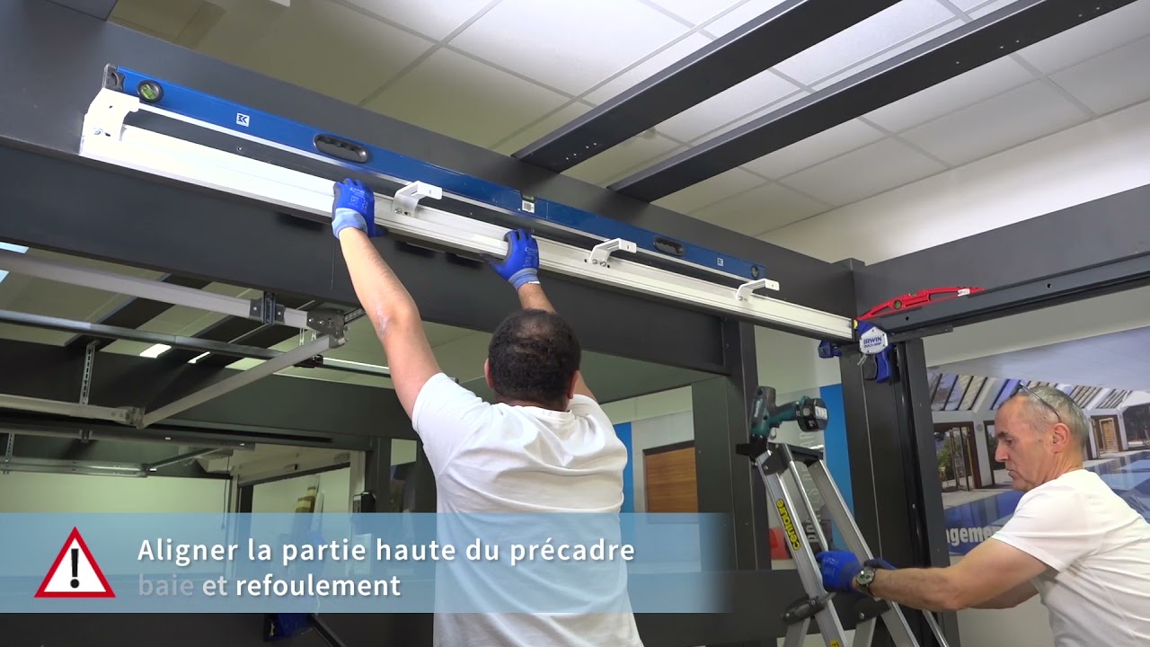 Pose porte de garage sectionnelle latérale Carsec Pro Soprofen