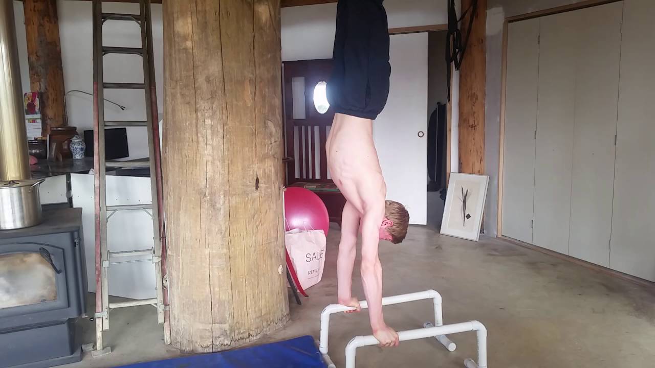 Handstand to L-sit on homemade PVC parallettes