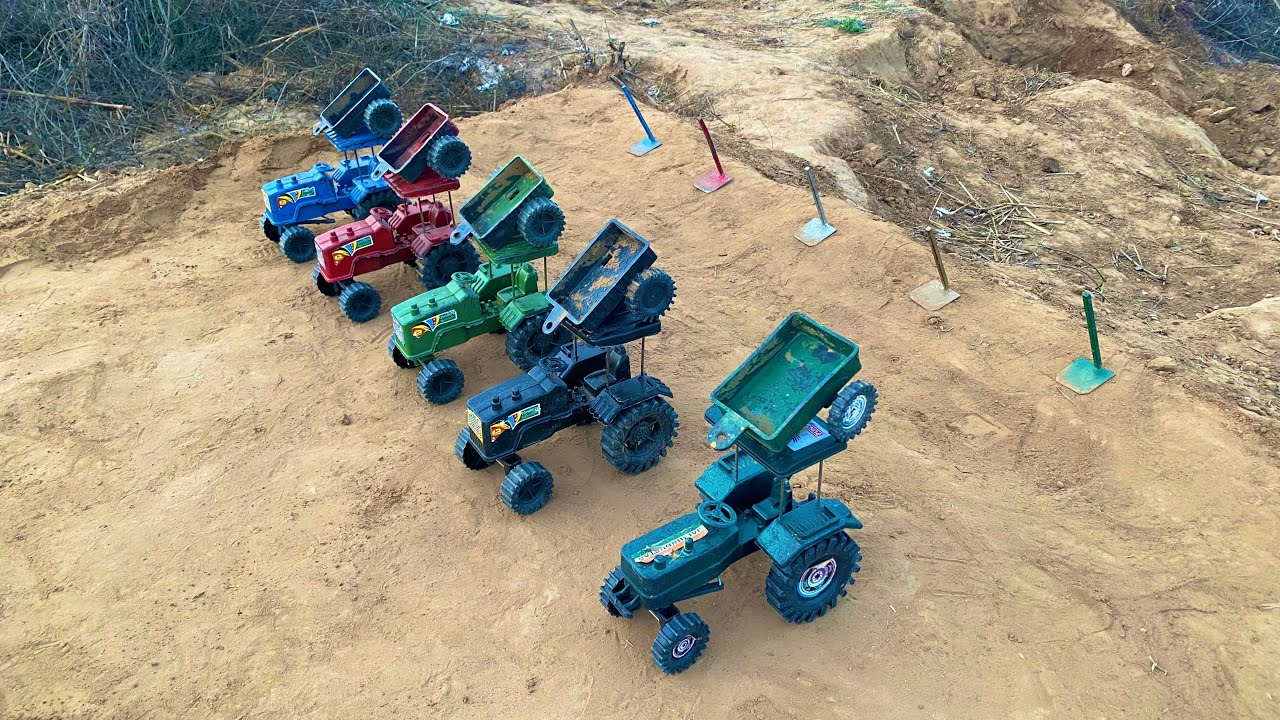 All the tractors carried their trolleys on top of them.