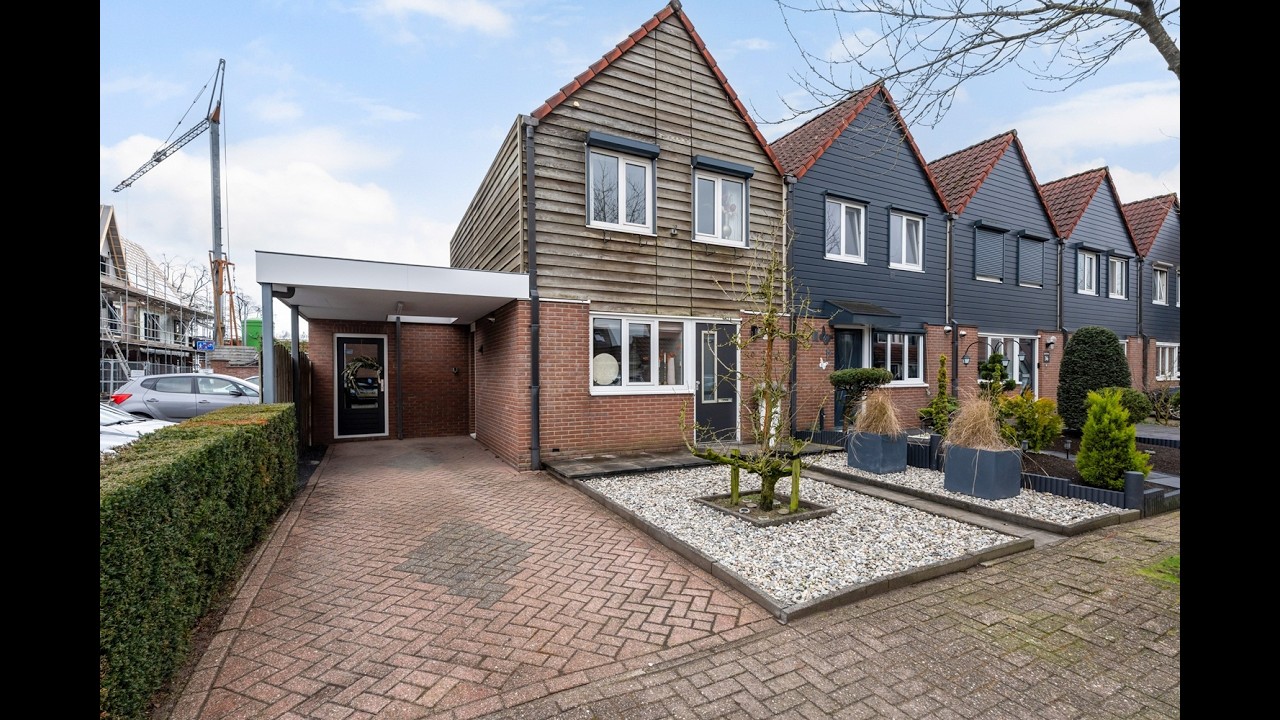 Henk Bos Makelaardij - Leuke hoekwoning met carport, oprit en tuin op het zuiden! De Ring 40 Wekerom