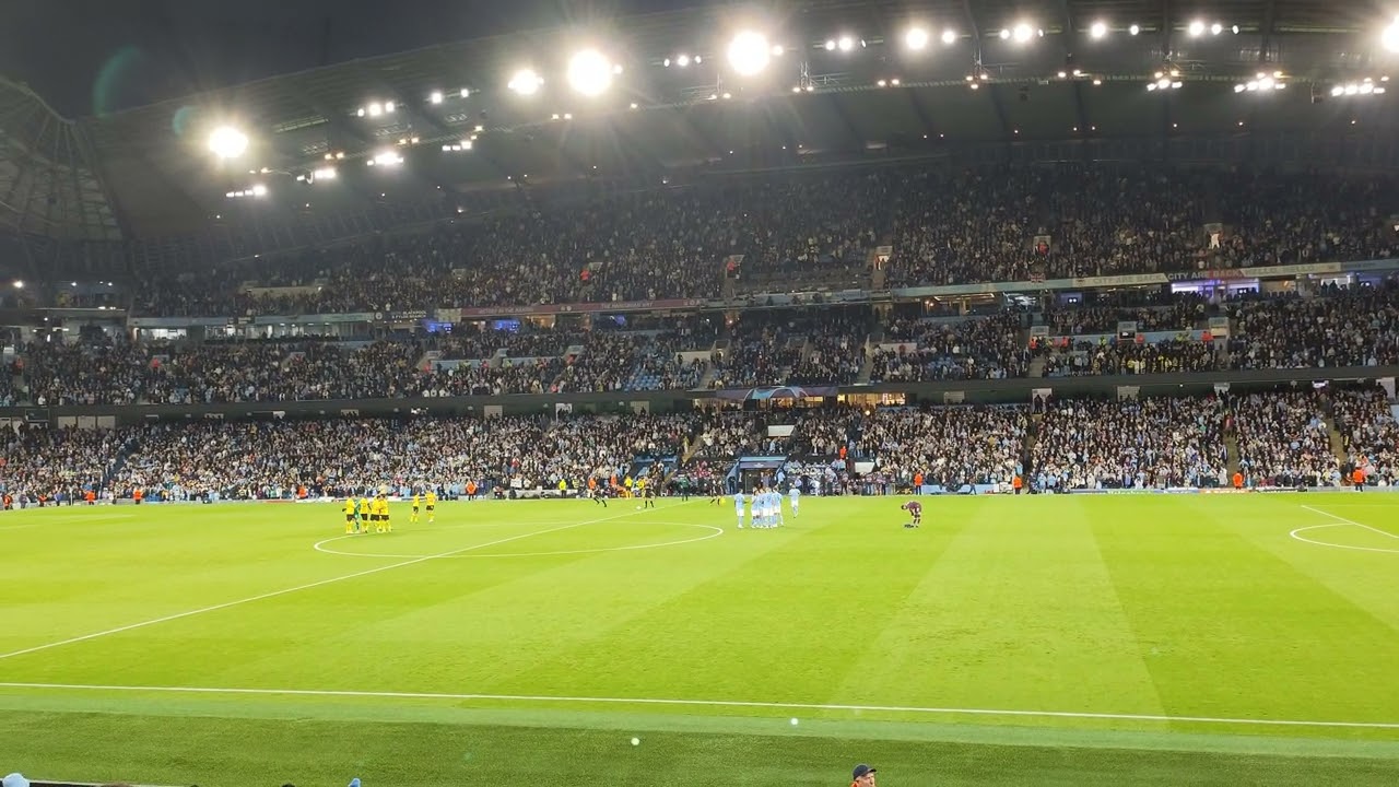 Man City fans observe moment of silence in memory of the Queen ahead of Dortmund game
