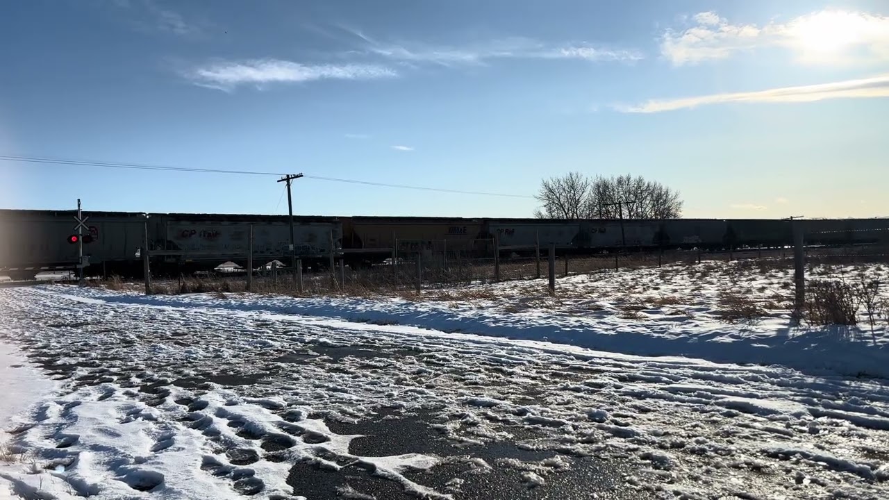 CP 8003 leads a CPKC empty grain train east on the Laggan sub with nice P5 horn at Glenbow Ranch, AB