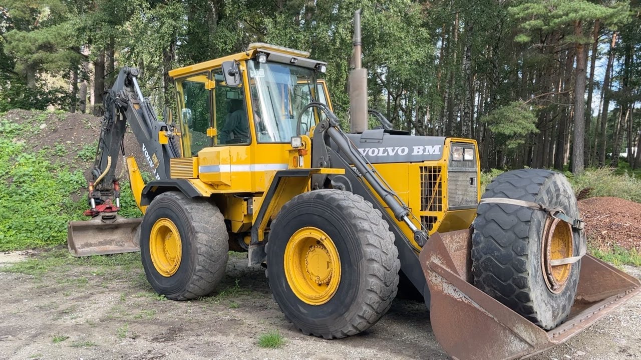 Köp Grävlastare Volvo BM EL70 med tiltrotator & skopor på Klaravik