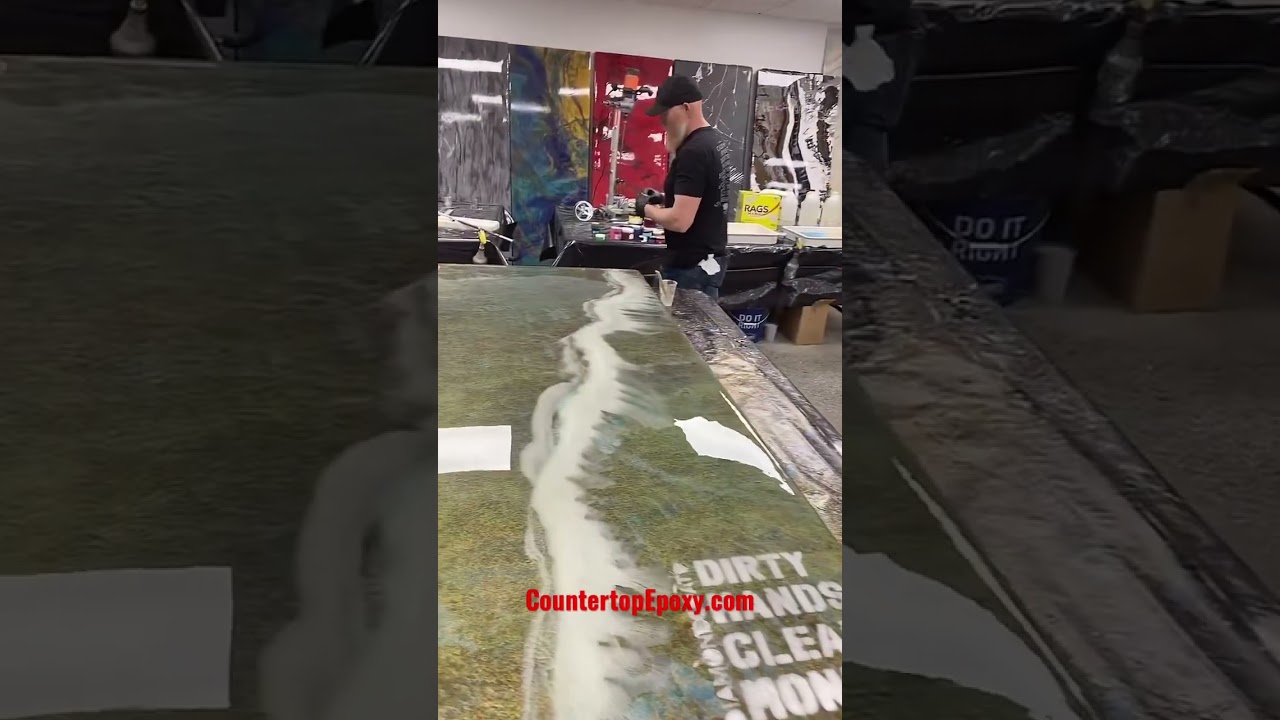 Sprinkling our glow in the dark powders on a clear coat of epoxy #shorts #countertopepoxy