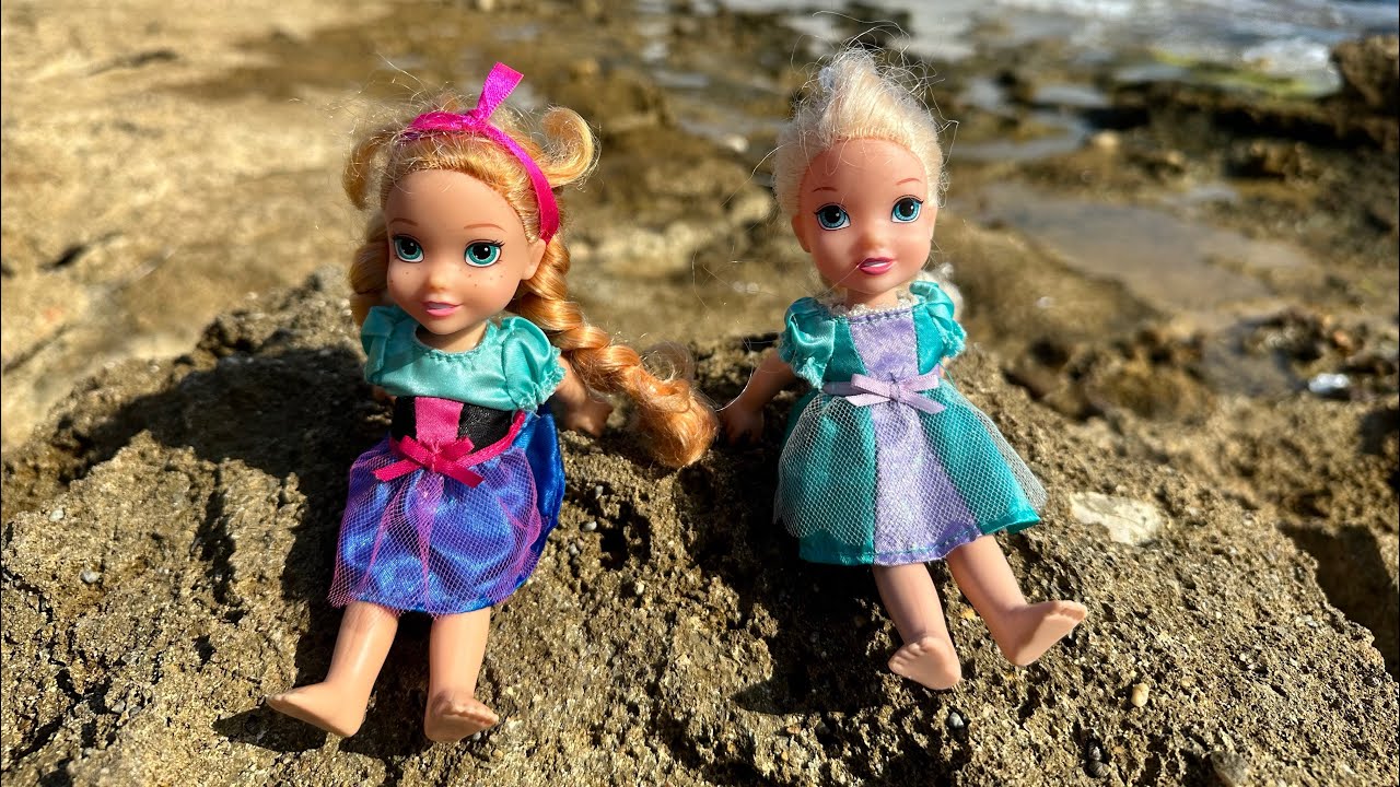 Elsa and Anna toddlers beach day