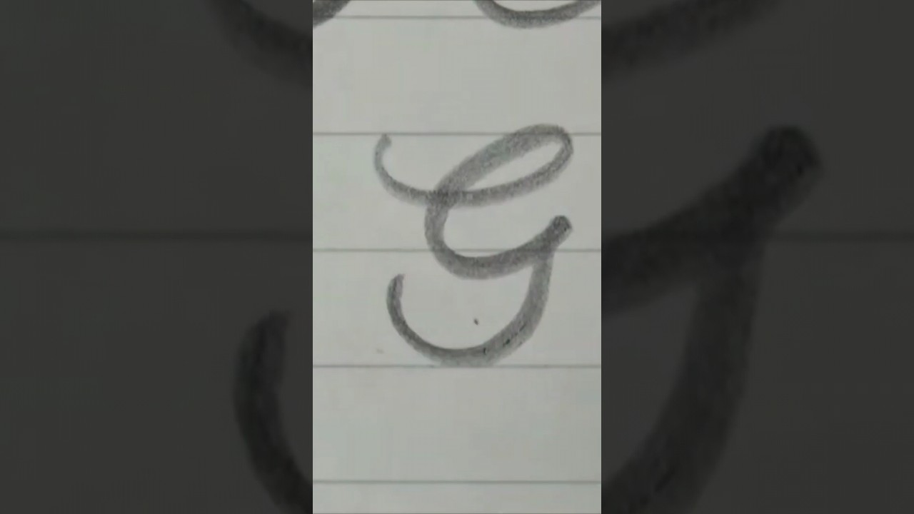 Letra G cursiva. 