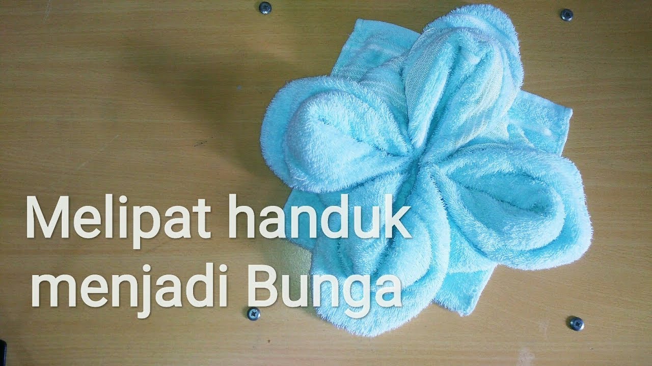 cara melipat handuk menjadi bentuk bunga sederhana