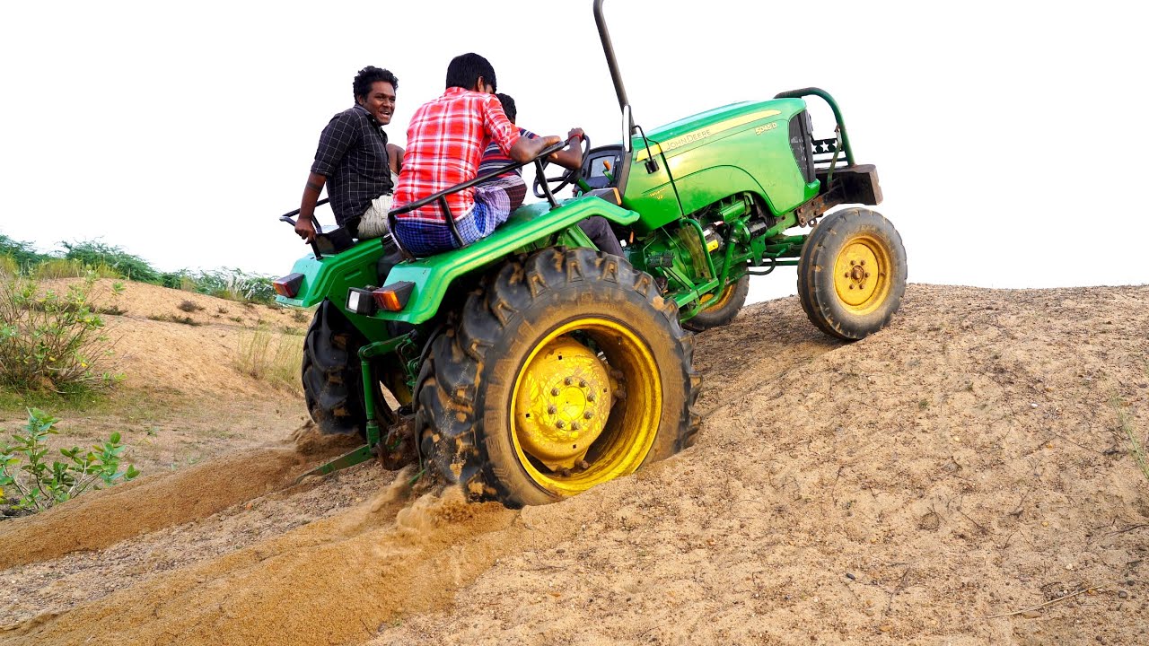 Testing the power and capacity of JOHN DEERE 5045D Tractor in river sand dune