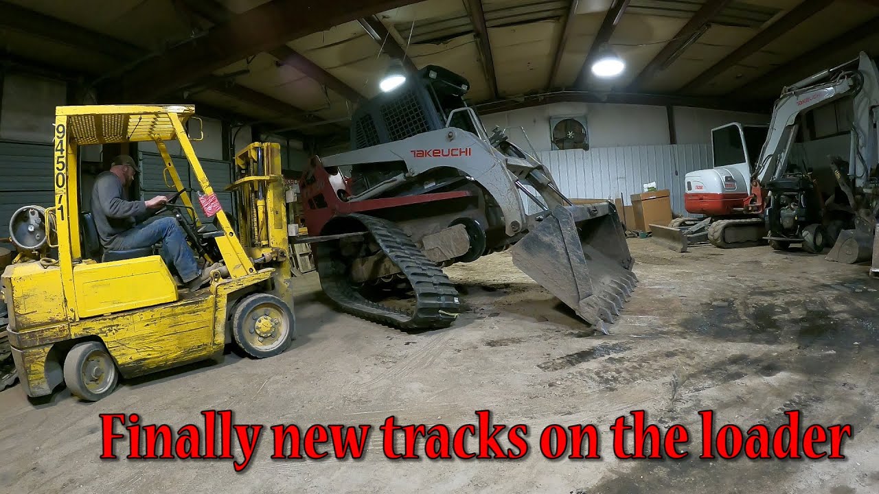 Installing New Tracks, Sprockets, Idlers And Rear Rollers On A Takeuchi TL250