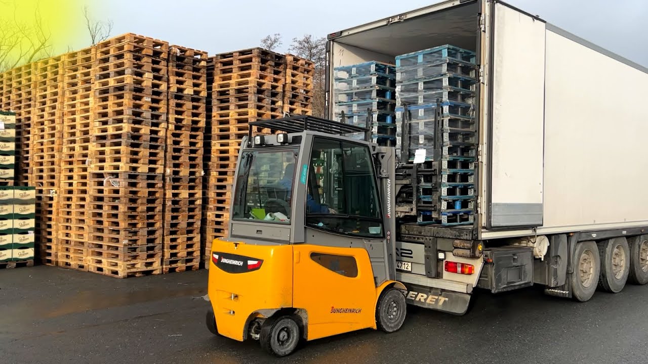 Loading trucks with pallets.