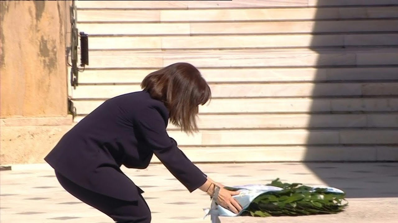 Greece's first woman president pays respect at Tomb of the Unknown Soldier | AFP
