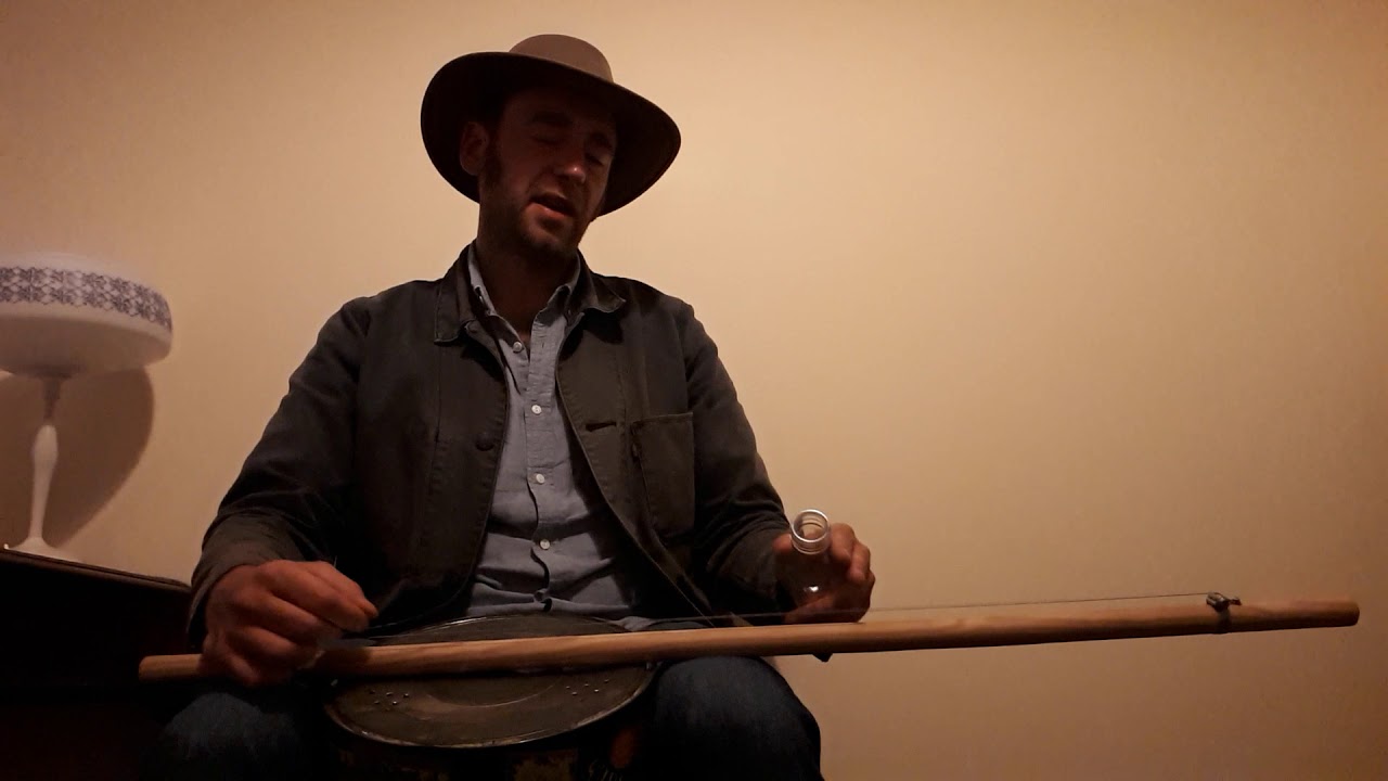 I Need a Hundred Dollars - Martin Swamps (with a one string guitar/diddley bow)
