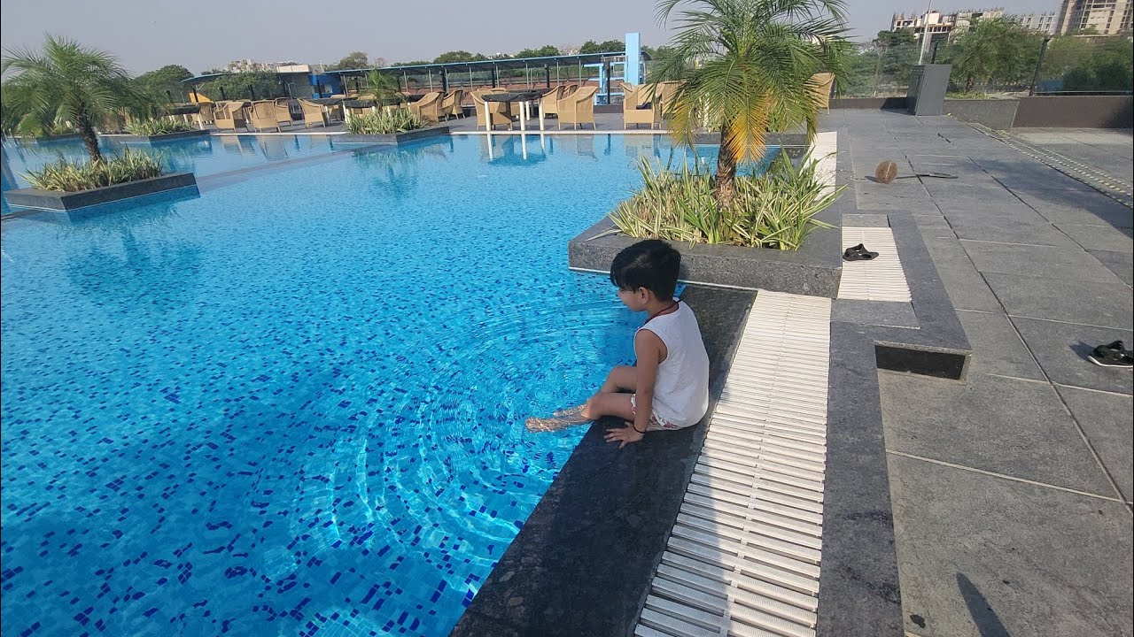 living in largest luxury hotel in indore with poolside view Essentia Luxury Hotel Indore #travelvlog