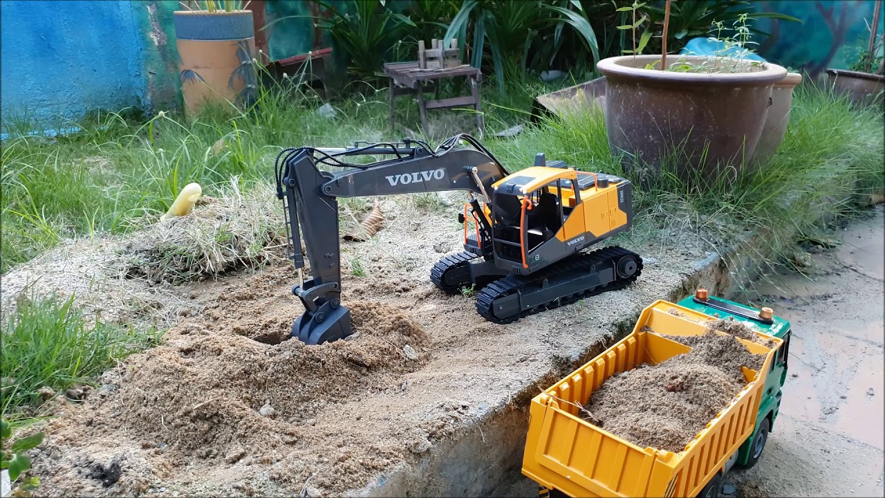 Double E volvo excavator and Man truck
