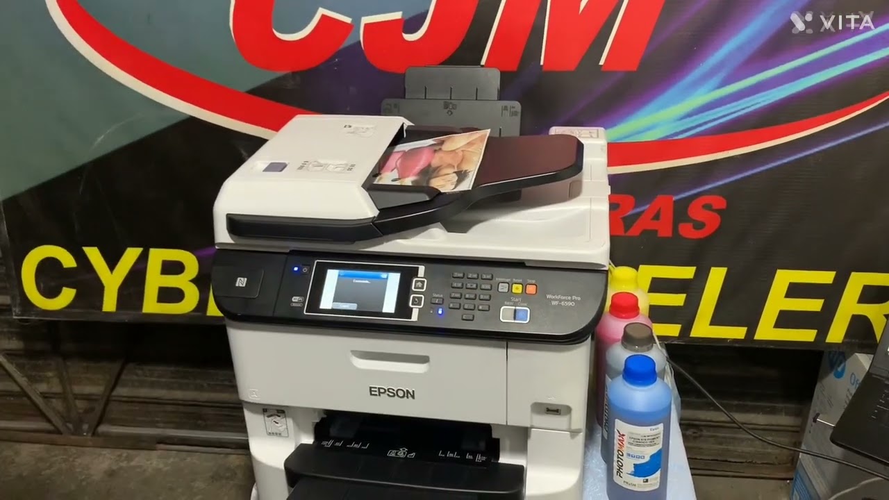 Impresora Epson Wf 6590 con sistema de cartuchos recargables á