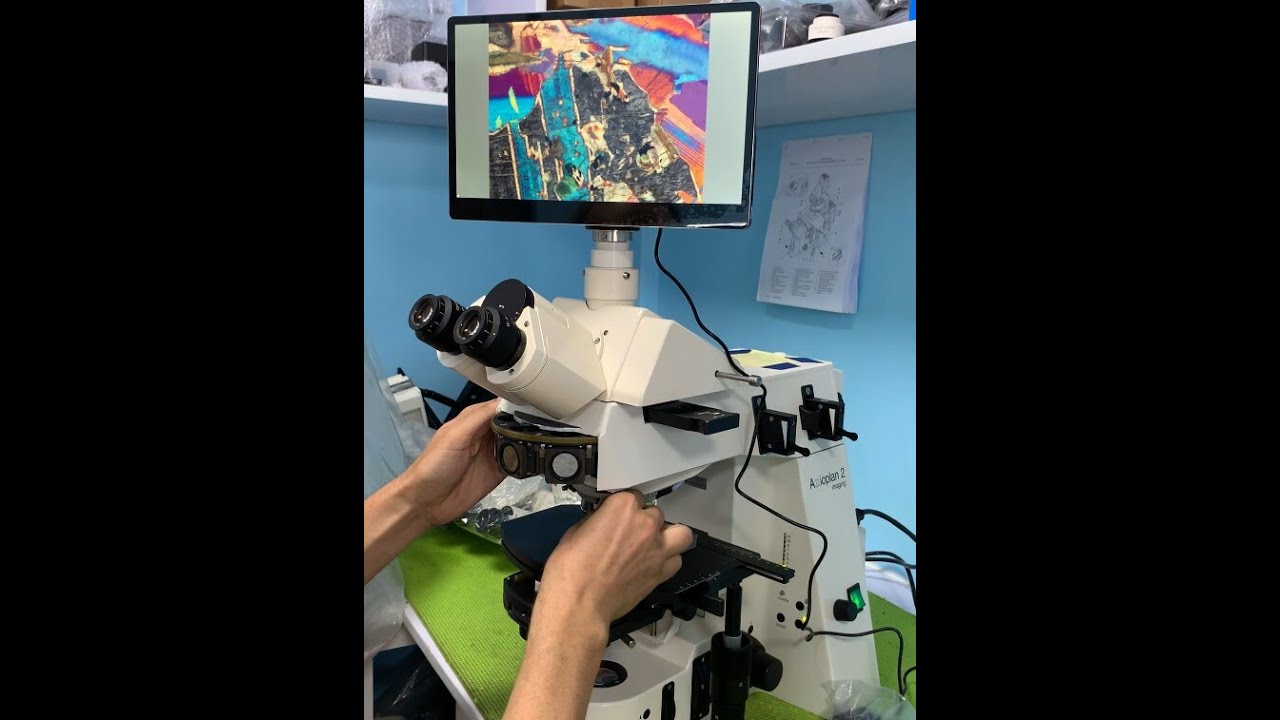 Zeiss Axioplan 2ie - Petrographic slides in DIC with Lambda Compensator - Birefringent Colors