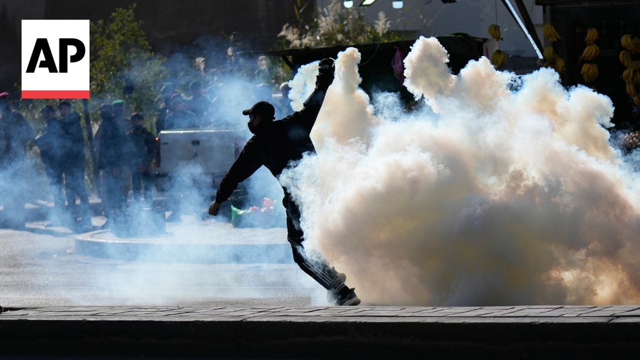 Protesters and police clash near US embassy in Iraq after Khamenei's death