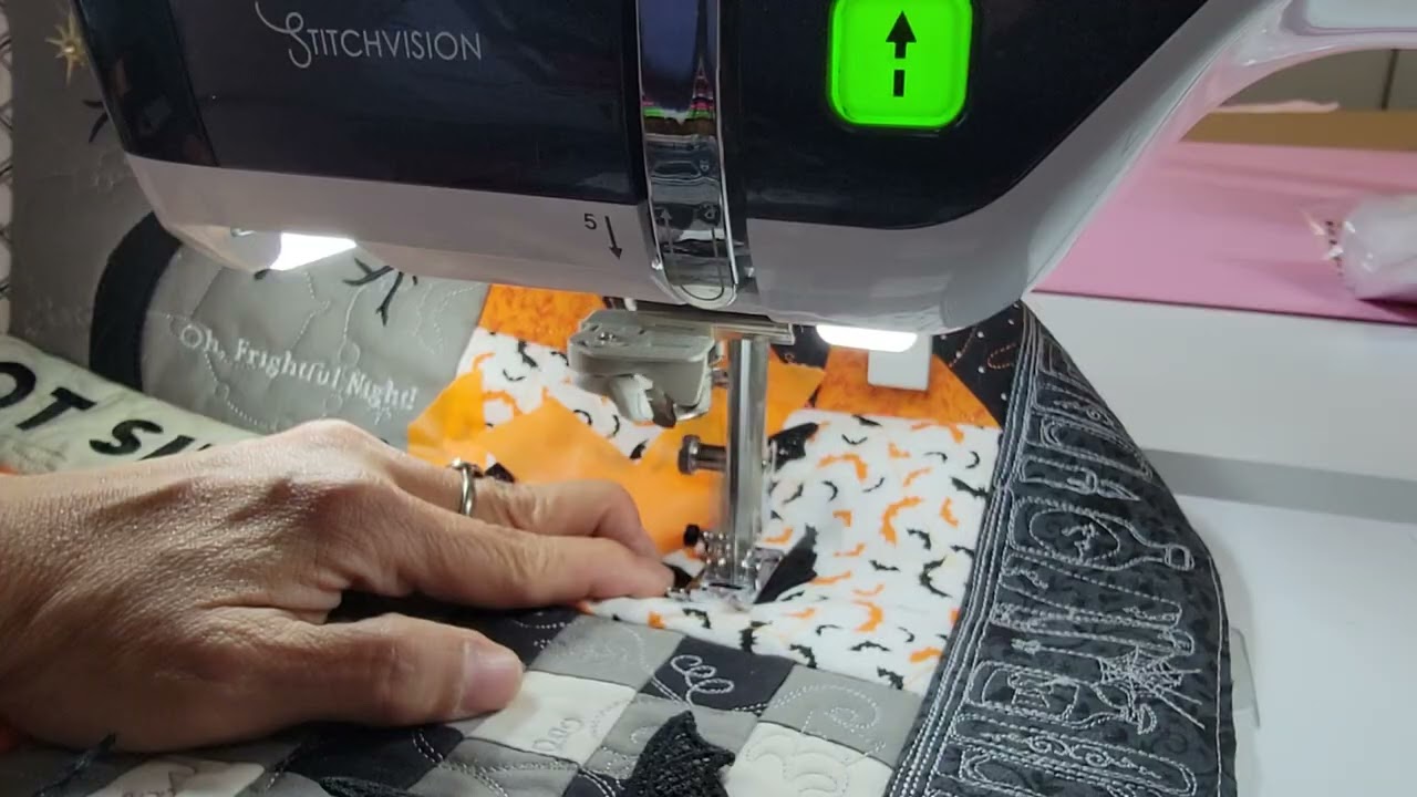 Kimberbell Pumpkins and potions: Embellishments Part 2: Sewing on the bats and the binding