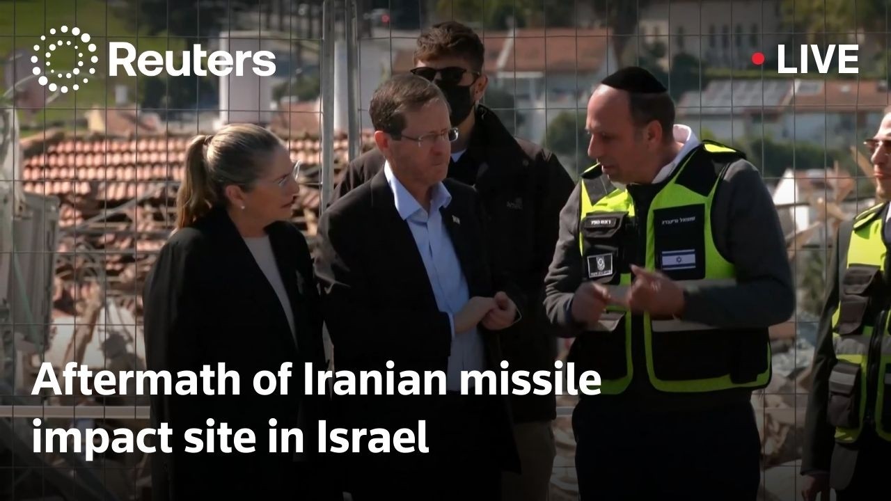 LIVE: Aftermath of Iranian missile impact site in Israel