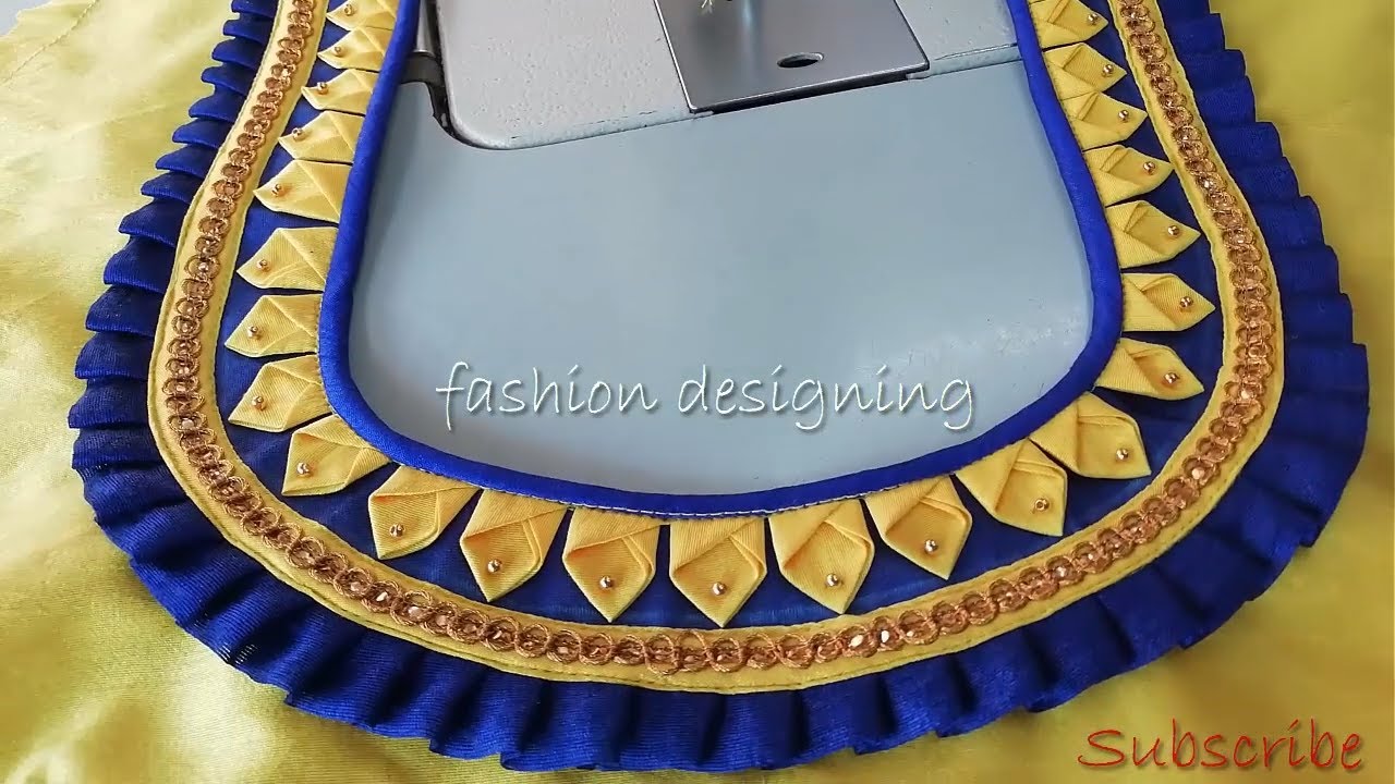 stitching of a beautiful blouse back neck design at home | fashion designing