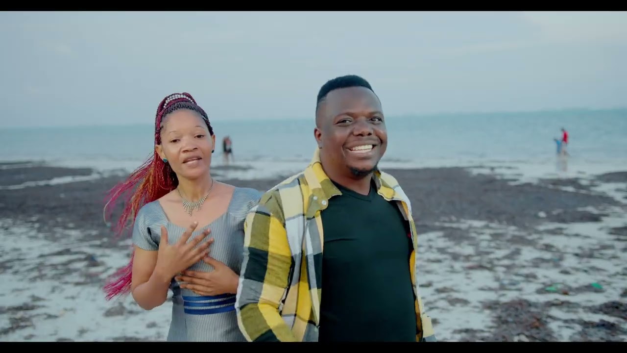 HOLLINES MASANJU FT ANNOINT AMANI - MUNGU ANAJUA (Official Video +254 727695902)
