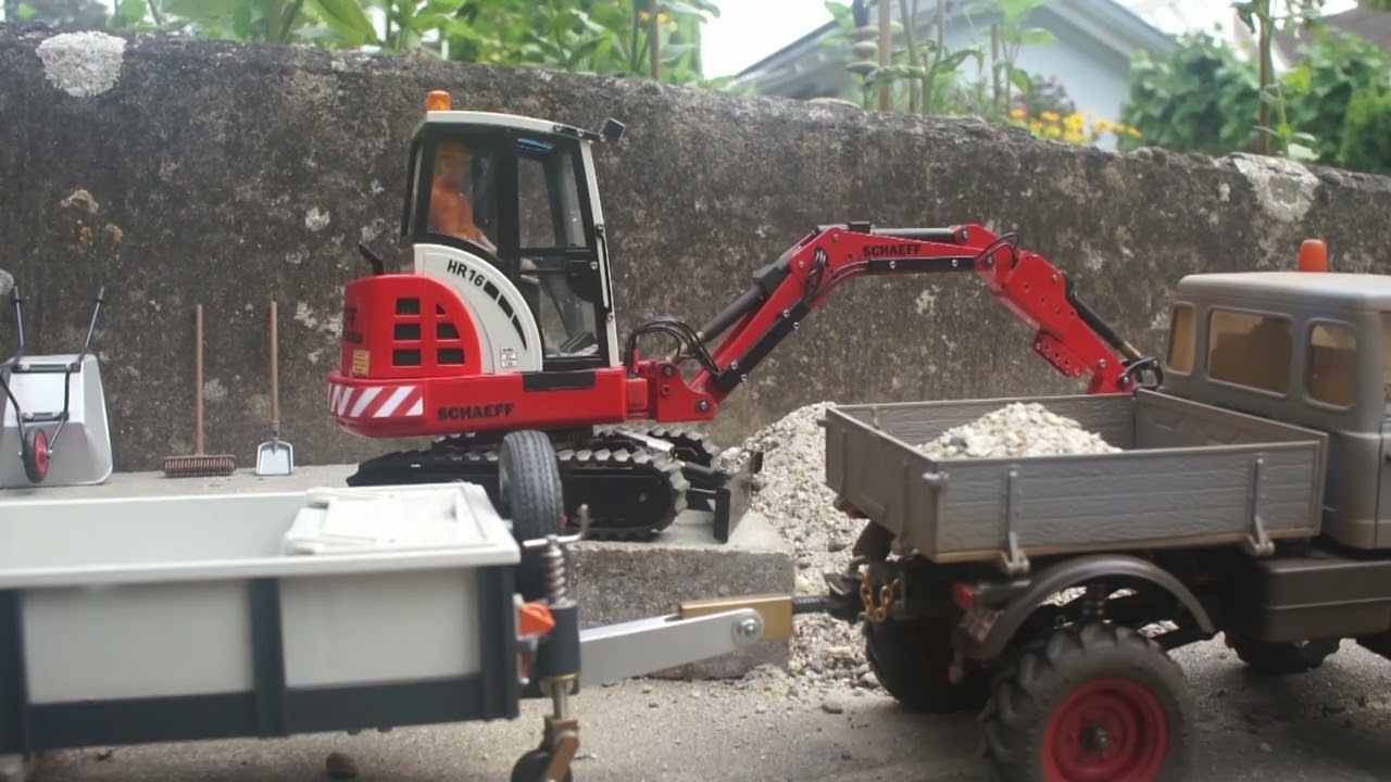 Unimog 421 mit Schaeff HR16  im Maßstab 1:16