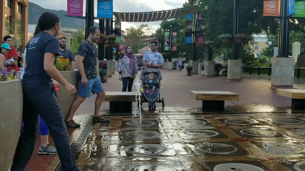 Weebles challenges strangers to race in the fountain