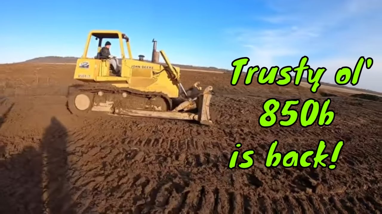 John Deere 850b comes out of retirement to fill in an abandoned pond before the rain hits