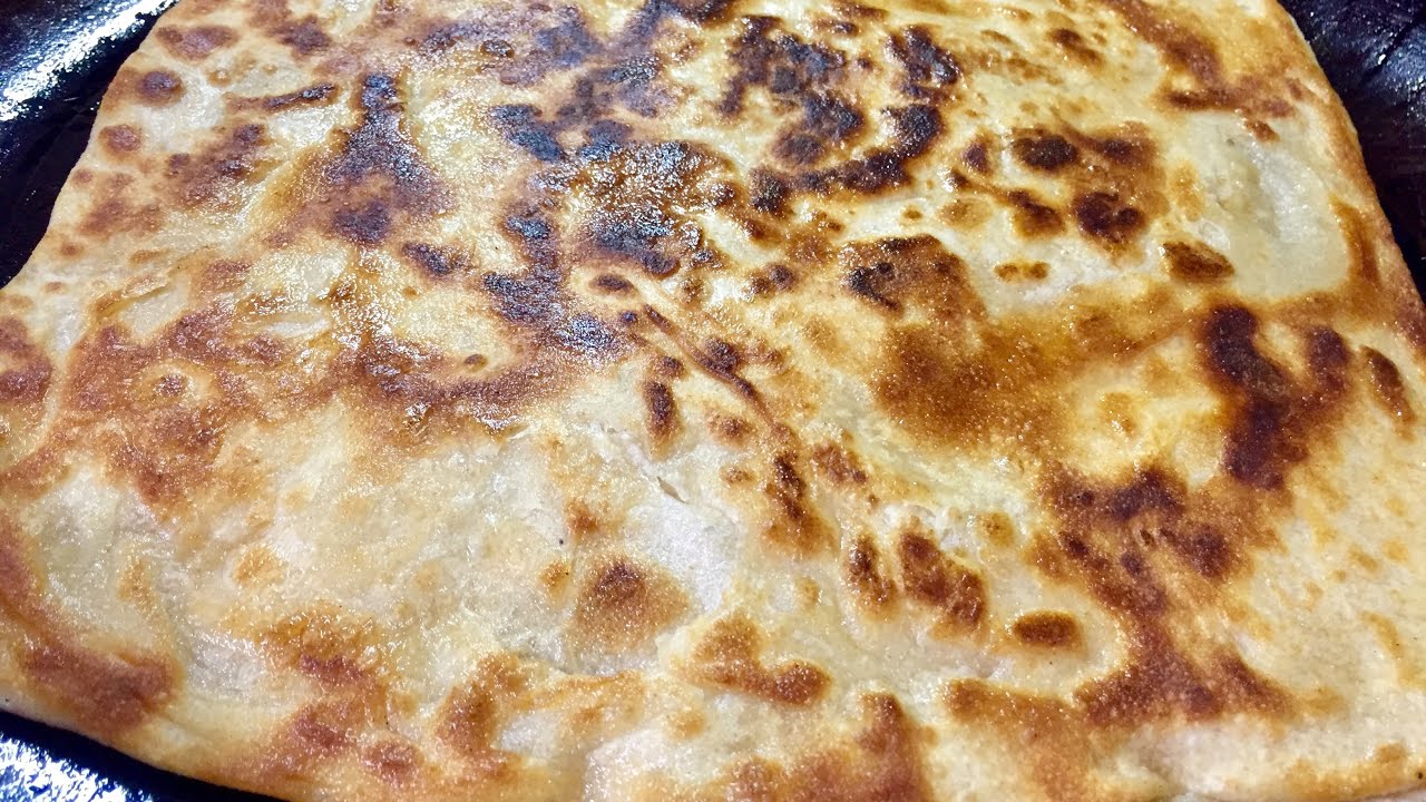 خبز الطاوه العدني  بالزيت فقط من دون زبده او سمن مورق ورطب من الداخل ومقرمش من الخارج