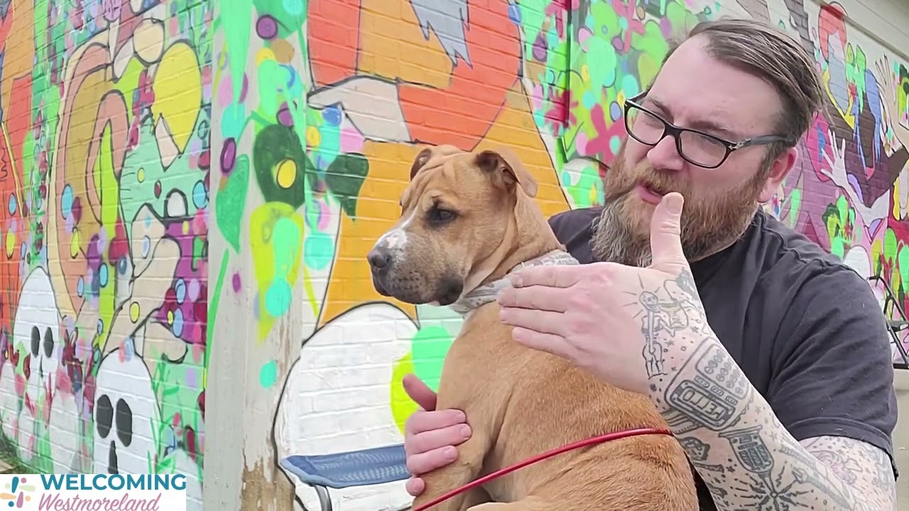 The Rev. Daisher Rocket explaining his artistic process