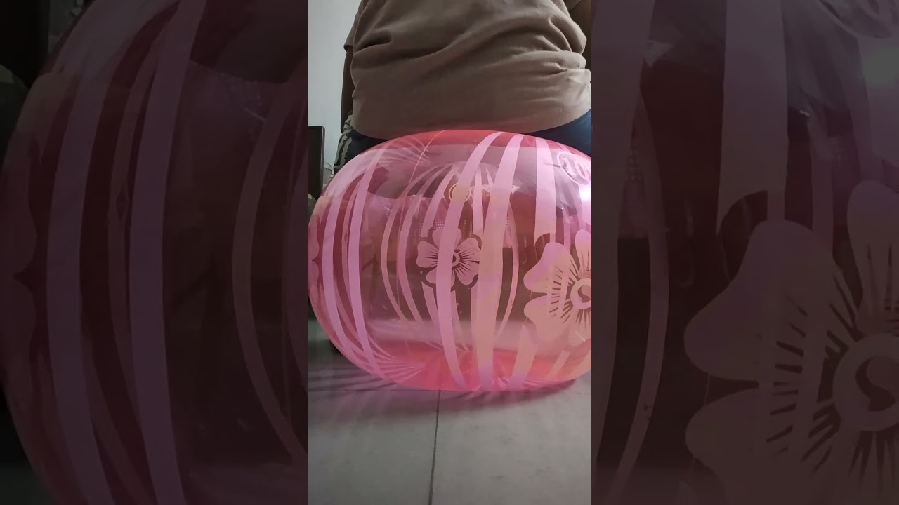 Sit to pop Beach ball #poppballons #beachball #popping
